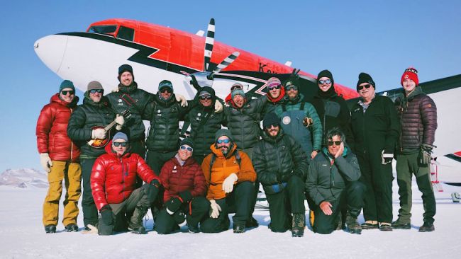 the BELARE team poses for one last photo at the PEA Airstrip before departure - &copy; International Polar Foundation