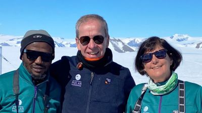 Civil Engineer Mphikeleli Amos Ndlela, Belgian Polar Secretariat Vice-President Piet Steel and South African Minister Barbara Creecy pose for a photo at the Princess Elisabeth Antarctica - © International Polar Foundation