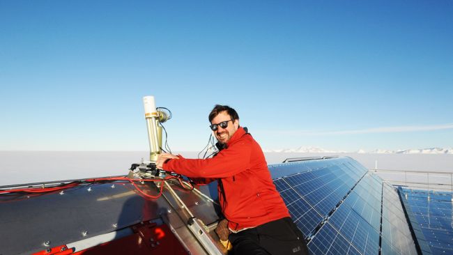 Alexis Merlaud on the roof of Princess Elisabeth Antarctica - © International Polar Foundation 