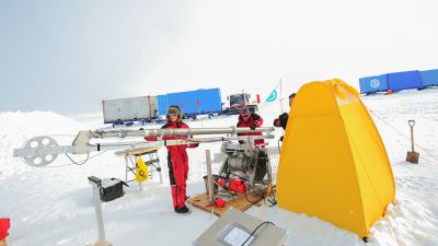 Checking out the drilling equipment used by the Icecon scientific team at the Field Camp. - © International Polar Foundation