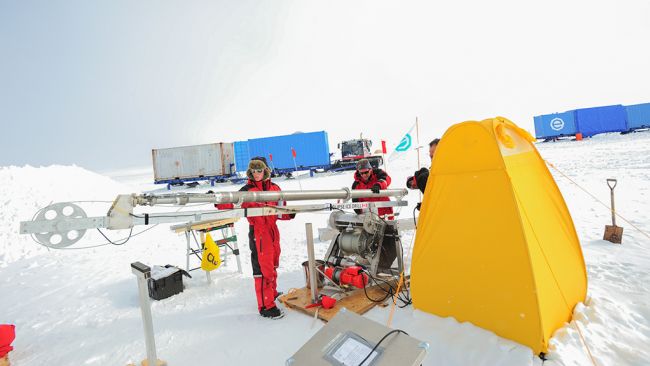 Checking out the drilling equipment used by the Icecon scientific team at the Field Camp. - © International Polar Foundation