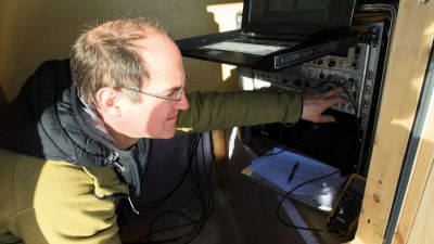 Olivier Francis at work in one of the scientific shelters - © International Polar Foundation - RenĂ© Robert