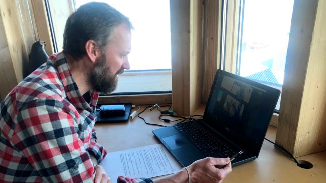 Henri Robert, IPF's Science Liaison Officer and Deputy Station Manager, starts a new video lecture with a school in Europe via Skype. - © International Polar Foundation