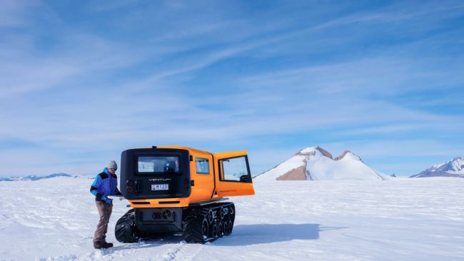 The Venturi Antarctica - the world's first fully electric polar exploration vehicle - seen here supporting field work for the EU Horizon 2020 HYPERNETS project. The Venturi Antarctica transported instruments the project used to collect data on solar radiation and albedo back to the Princess Elisabeth Antarctica. - © International Polar Foundation