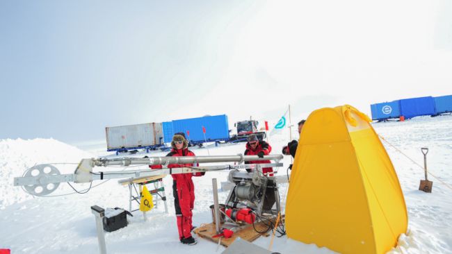 Morgane Philippe and Jean-Louis Tison checking the new drilling equipment used by the Icecon scientific team at the Field Camp. - © International Polar Foundation