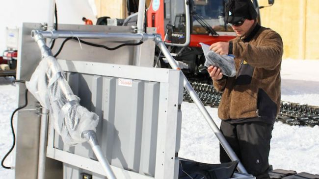 Nicolas Bergeot preparing scientific equipment for the expedition. - © International Polar Foundation