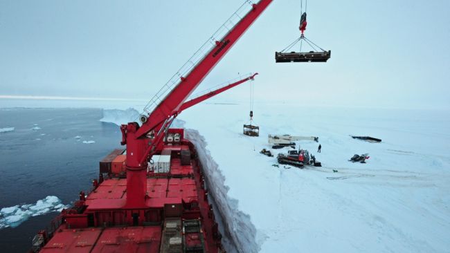 The Mary Arctica alongside the ice-shelf. Those cranes were very handy to get equipment on the ice-shelf! - © International Polar Foundation