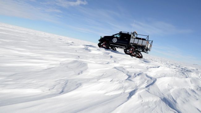 The high plateau is a very hostile environment and the steep slopes are a good testing ground for our new customised Hilux on tracks. - © International Polar Foundation / Alain Hubert