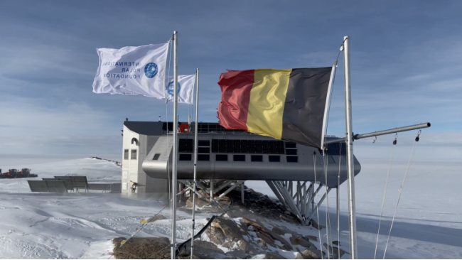 Flags blowing in strong wind at the Princess Elisabeth Antarctica