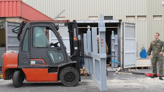Militaries loading the containers - International Polar Foundation
