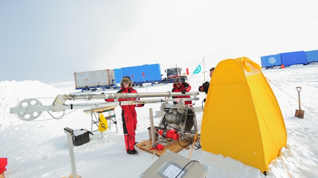 Checking out the drilling equipment used by the Icecon scientific team at the Field Camp. - International Polar Foundation