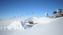 Clearing the accumulated snow in front of the garages - International Polar Foundation / Alain Hubert