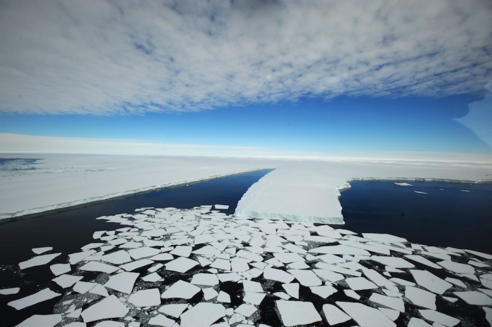 In this aerial view of Crown Bay, you can see that the ice we used to unload the containers has now melted and broken apart. - International Polar Foundation