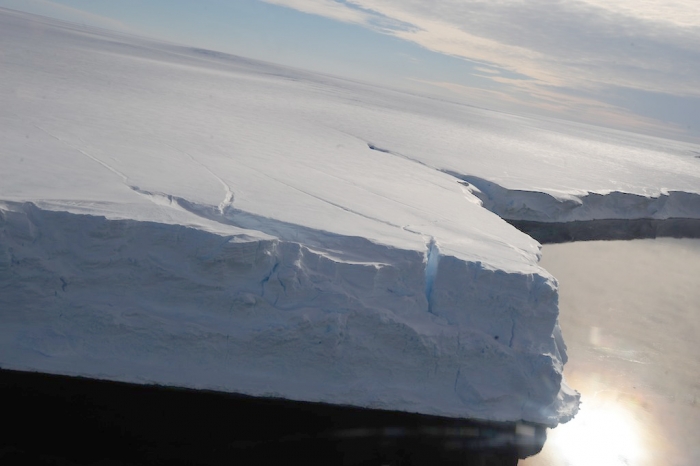 The cliffs here are almost 40 metres high. This is why we have to unload on sea ice and build a ramp every year. - International Polar Foundation