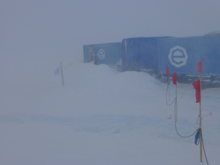 Wild weather whips around the field camp on the Antarctic plateau, beset by severe weather. - International Polar Foundation/Alain Hubert