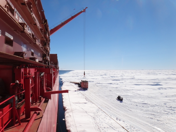 Unloading the Mary Arctica at the Antarctic Coast - International Polar Foundation/Alain Hubert