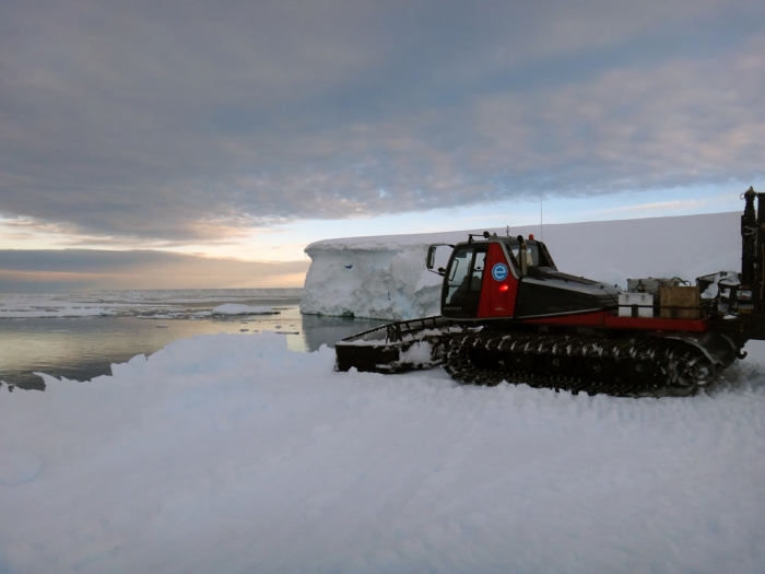 One of our Prinoth tractors facing Crown Bay after participating in the successful unloading.
 - International Polar Foundation