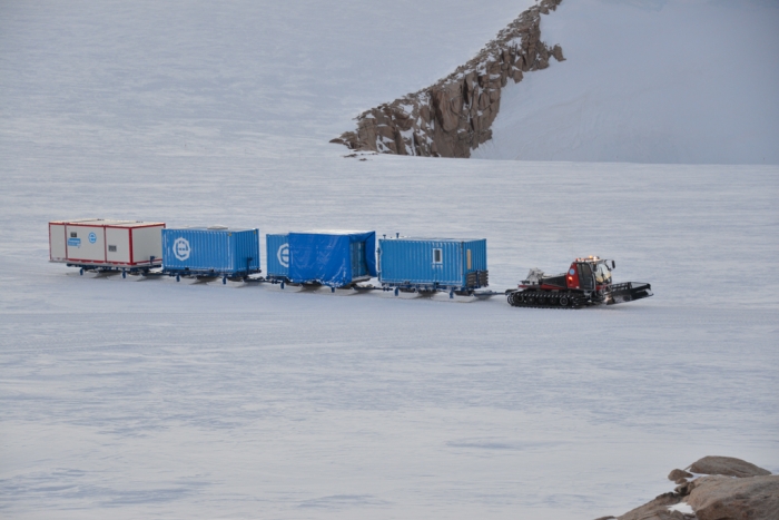 The base camp from the Belgo-Japanese SAMBA meteorite program being towed back to Princess Elisabeth Antarctica, during the BELARE 2012-2013 expedition.  - International Polar Foundation