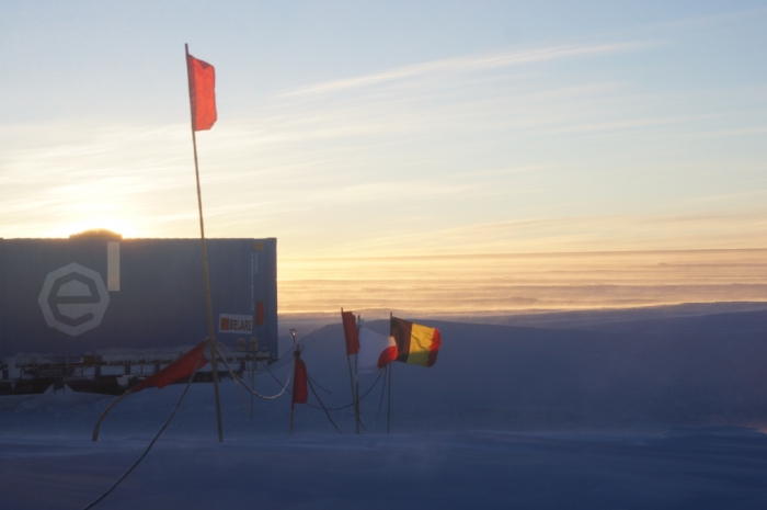 Belgian and Japanese flags at the SAMBA meteorite team basecamp on the plateau, during a field trip on the Nansen Ice Field, 140km south of Princess Elisabeth Antarctica, during the BELARE 2012-2013 expedition.  - International Polar Foundation