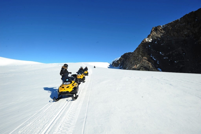 Discovering a nice access route to the east of Nils Larsen with the helicopter pilots. - International Polar Foundation
