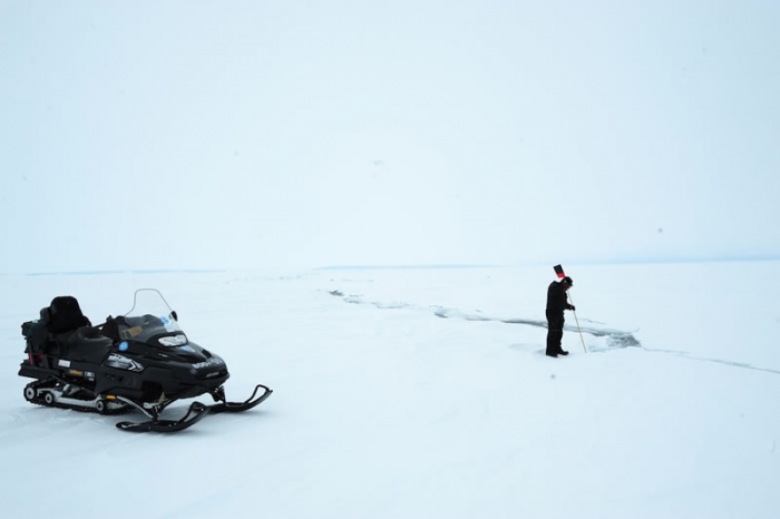 Before taking anyone into the field, we plan reconnaissance expeditions to map out crevasses zones and mark safe paths with flags on poles. - International Polar Foundation