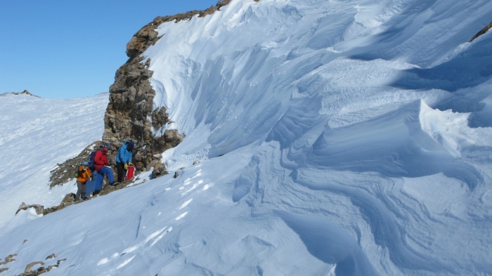 Outcrops alongside a glacier seen during a survey. - International Polar Foundation