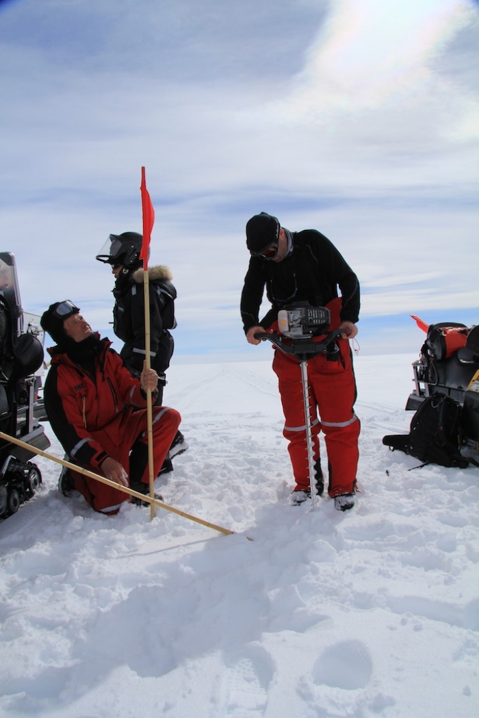 Bamboo poles mark out a safe route for the team when heading into the field
 - IPF