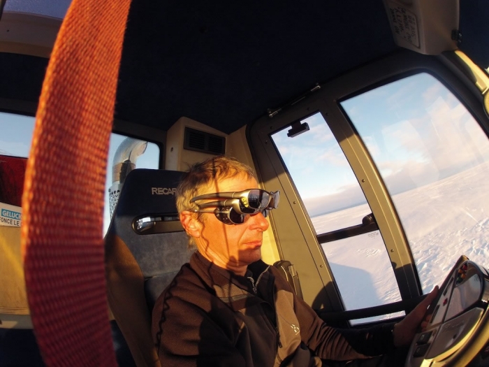 Jacques needs to wear extra sunglasses around midnight during his driving shift. - International Polar Foundation