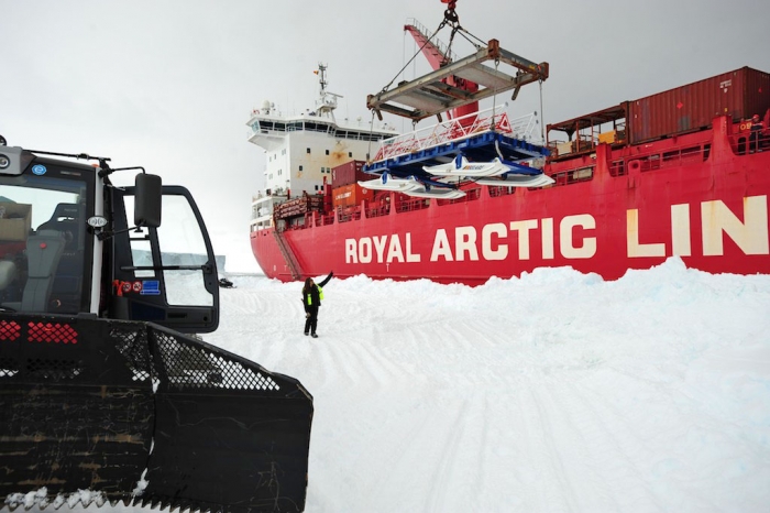 Nighat Amin, who is in charge of logistics, is supervising the unloading operations. - International Polar Foundation