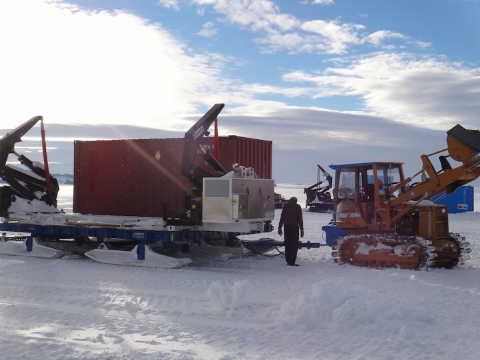 The team loads the garbage containers - International Polar Foundation